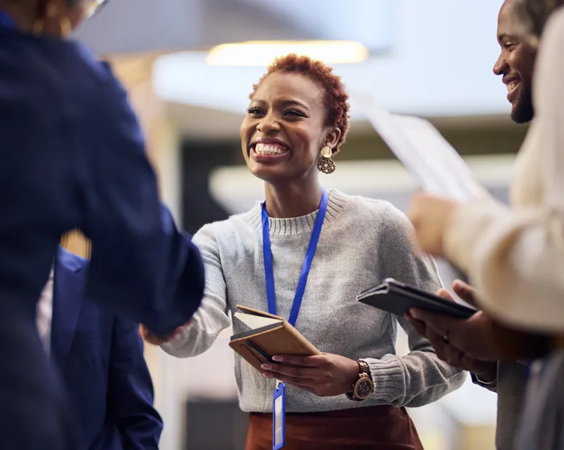 smiling shaking hands